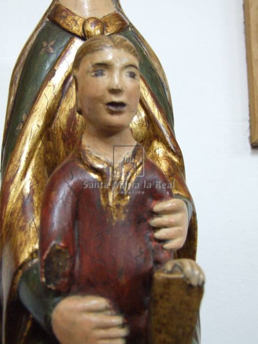 Detalle de la talla de la Virgen de la Caridad sedente con el Hijo sentado