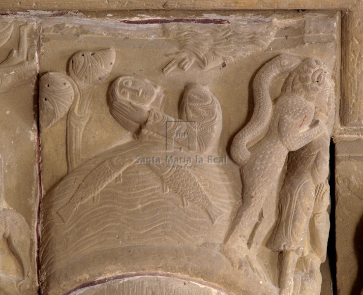 Capitel de la pilastra sureste. San Ginés decapitado en las aguas del Ródano
