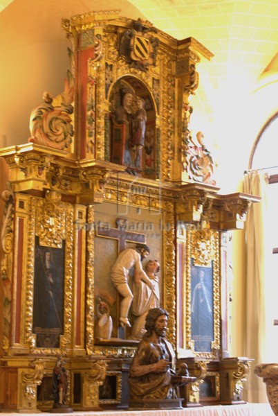 Retablo de San Bernardo, con la Virgen del Real en el ático